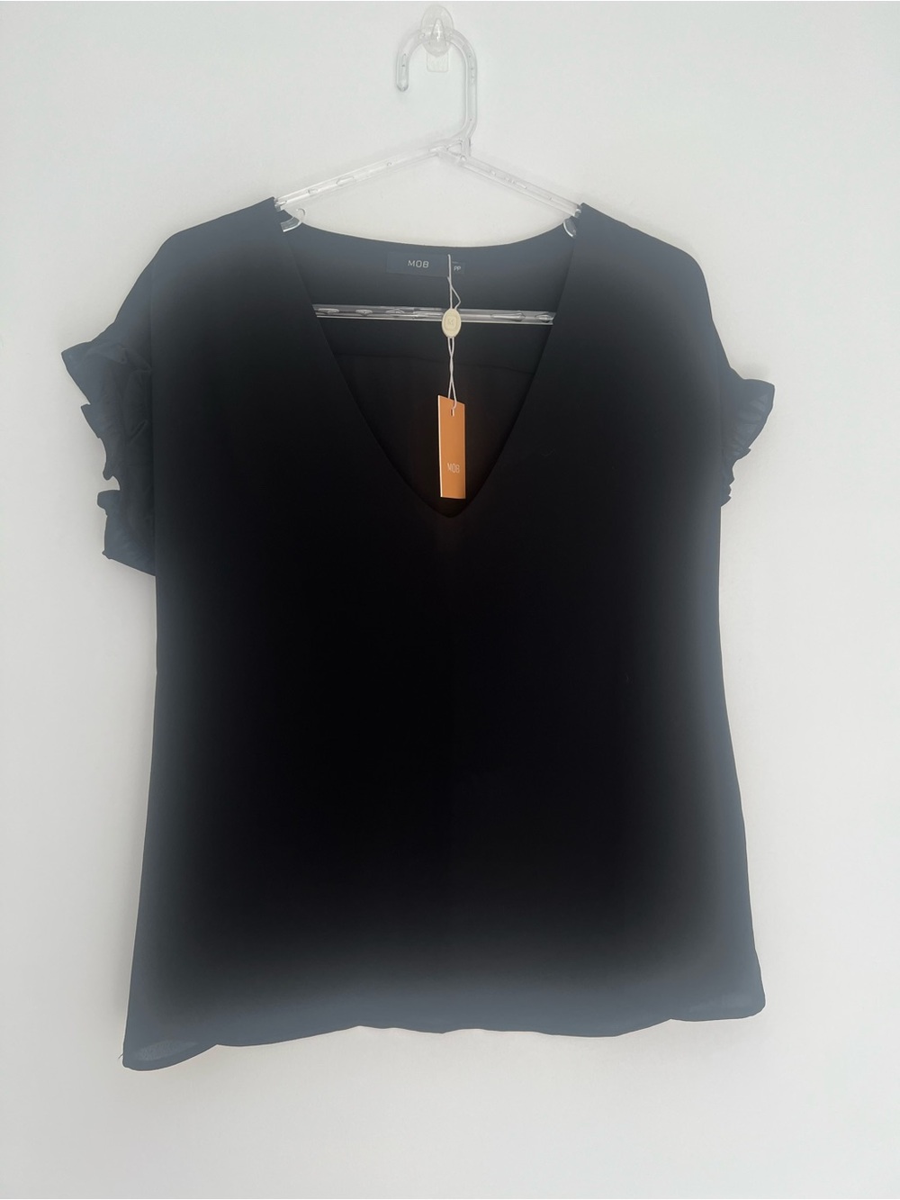 Women’s black short sleeve v neck blouse
